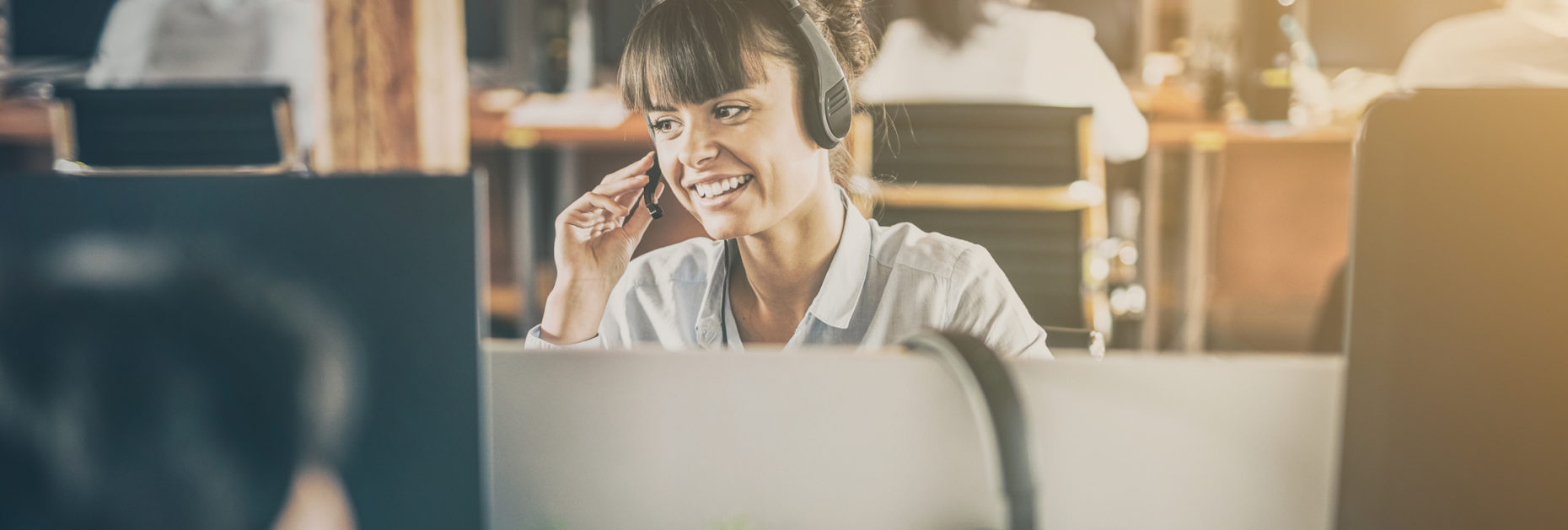 Call center worker accompanied by her team.